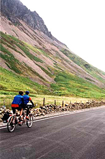 Tandem cyclists in the mountains of Snowdonia