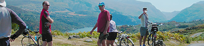 Group of cyclists high up in Snowdonia, North Wales